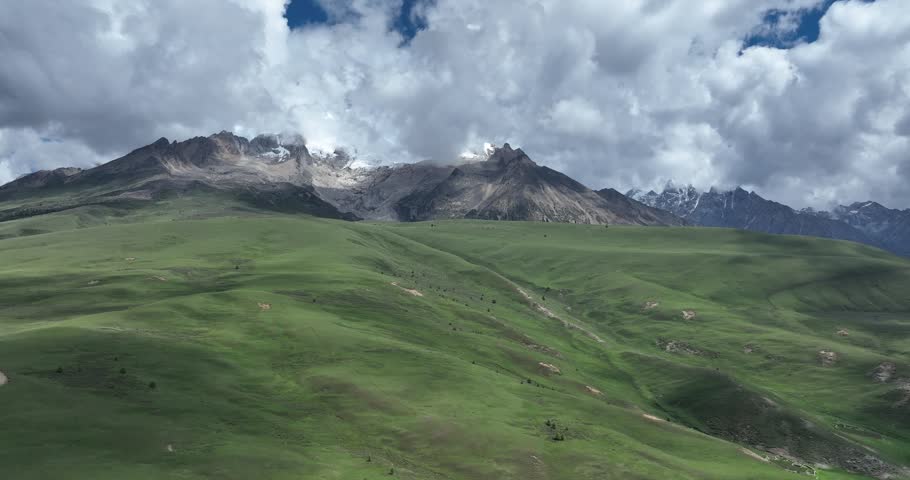 Aerial view of beautiful high altitude grassland mountain and canyon landscape	