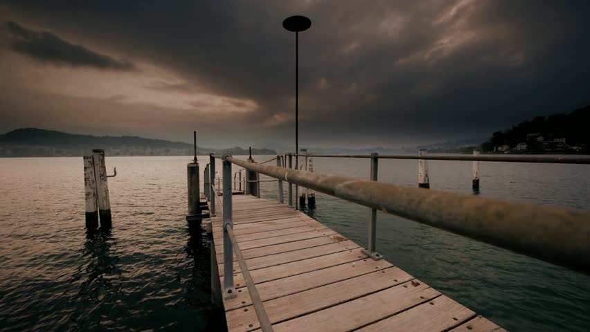 lake pier bridge. road street. panorama view. dark mood. time lapse