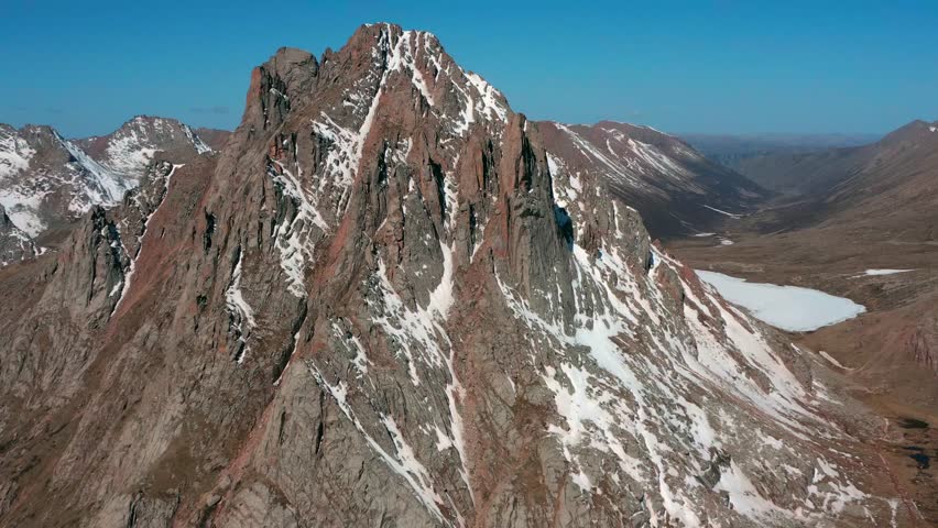 Aerial View of Rocky Stone Mountains on Tibetan Plateau Revealing Vast Natural Scenery