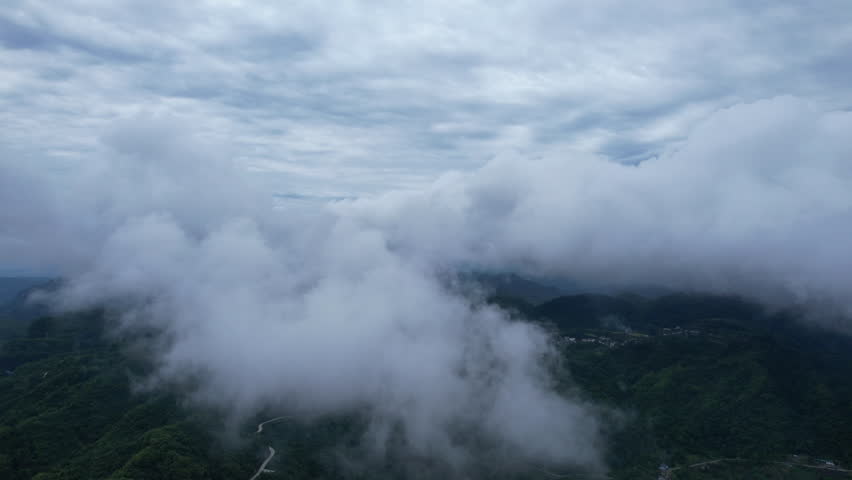 High Mountains with Rolling Mist and Vast Sea of Clouds Aerial