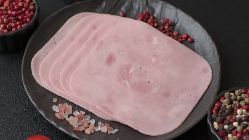 Meat, square ham sliced, organic food, protein for snacks. Sliced ham as a food background for your design