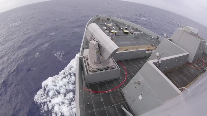 A spectacular missile launch from the deck of the USS Green Bay during a routine combat exercise. Flames and smoke billowed as the projectile soared into the sky, demonstrating the combat readiness of the U.S. Navy fleet in the area of ​​operations.