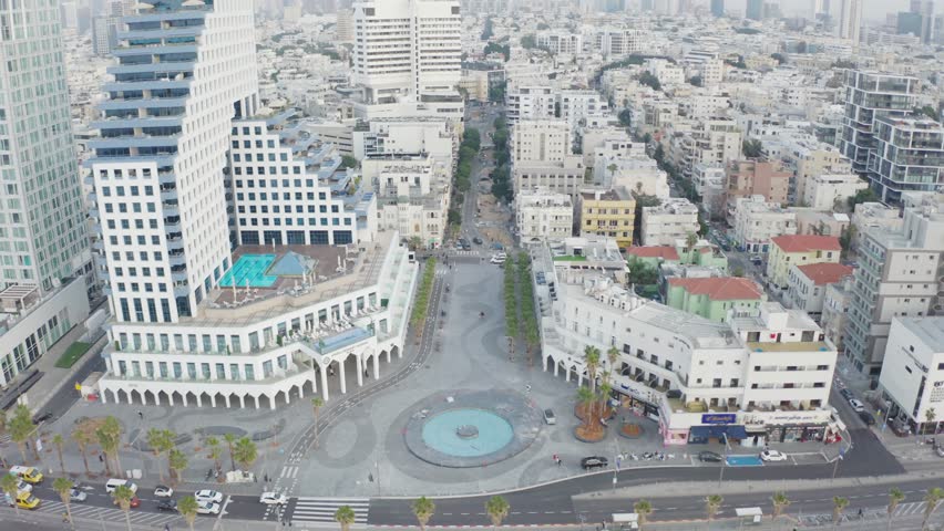 Tel Aviv cityscape from above with modern buildings and a bustling street scene, showcasing urban life and architecture