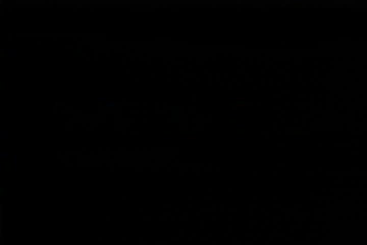 1920s - Henry Ford and John Burroughs work on an early steam engine in a factory and Burroughs cuts down a tree.