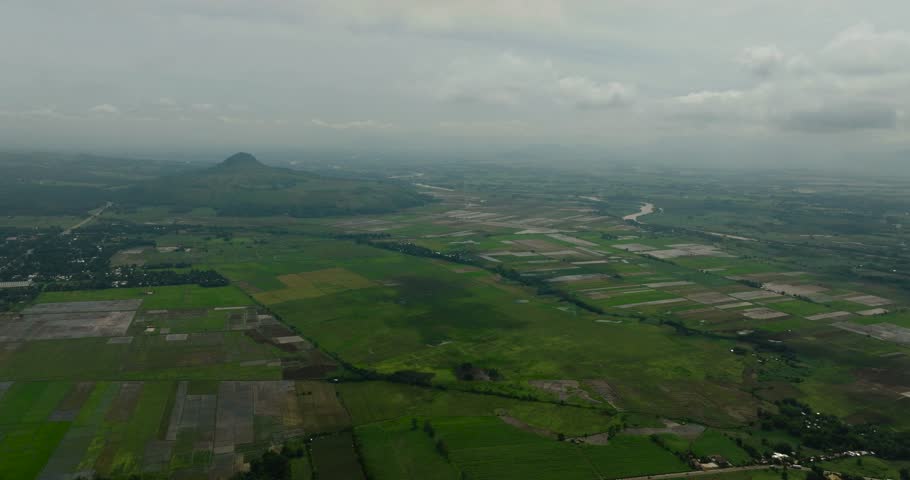 Farmland with growing fields, agricultural land in mountain. Mindanao, Philippines.