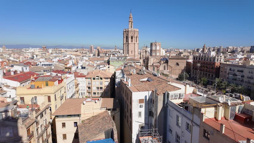 Aerial view of the city of Valencia with its medieval cathedral and its tower Miguelete, Spain.
