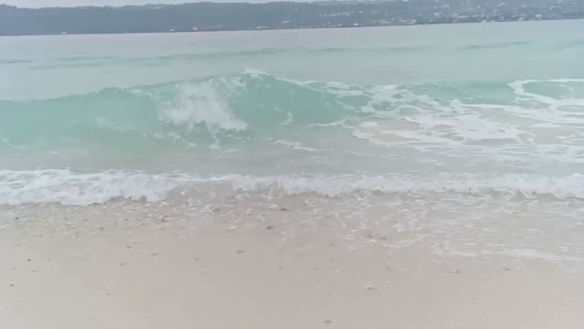 Powerful Ocean Waves Crashing on a Tropical Shoreline