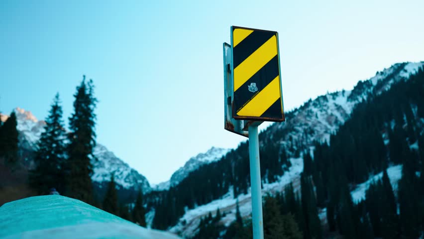 Road Warning Sign in Mountain Area Safety and Transport Concept