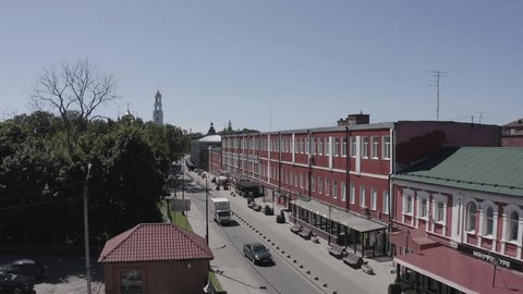 Rising Drone View over Urban Road Buildings