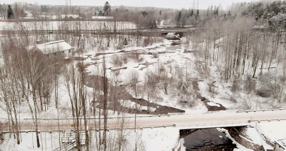 Aerial view of Vantaankoski rapids in cloudy winter weather, Vantaa, Finland, Europe.