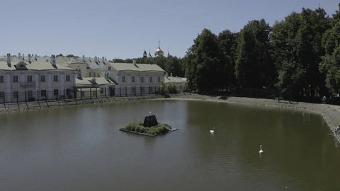 Drone Rising above Church Domes Cityscape