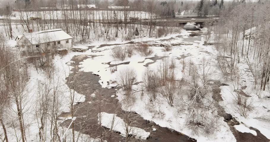 Aerial view of Vantaankoski rapids in cloudy winter weather, Vantaa, Finland, Europe.