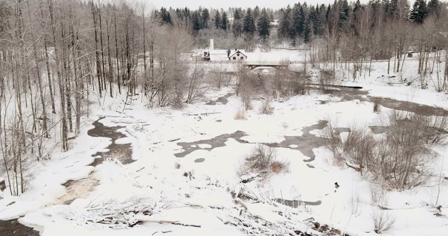 Aerial view of Vantaankoski rapids in cloudy winter weather, Vantaa, Finland, Europe.