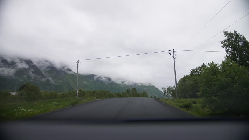 Foggy mountain road Norway view from car