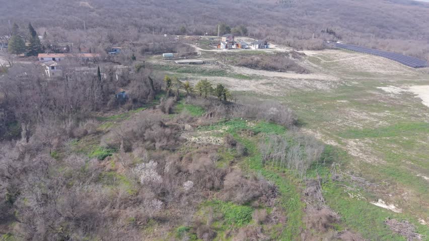 Scenic panorama of rural landscape with fields hills and blue sky with clouds