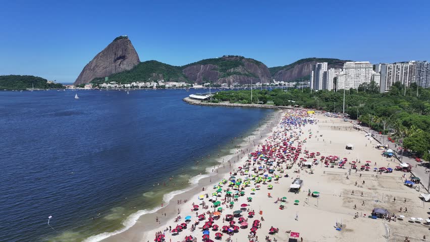 Flamengo Beach In Rio De Janeiro In Brazil. Sugarloaf Mountain Scenery. Downtown District. Guanabara Bay Skyline. Flamengo Beach In Rio De Janeiro In Brazil. Beautiful Cityscape.