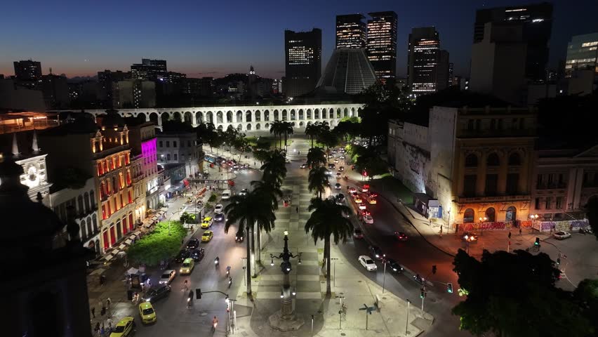 Sunset Skyline In Arches Of Lapa In Rio De Janeiro In Brazil. Sunset Landscape. Downtown District. Landmark Monument. Sunset Skyline In Arches Of Lapa In Rio De Janeiro In Brazil.