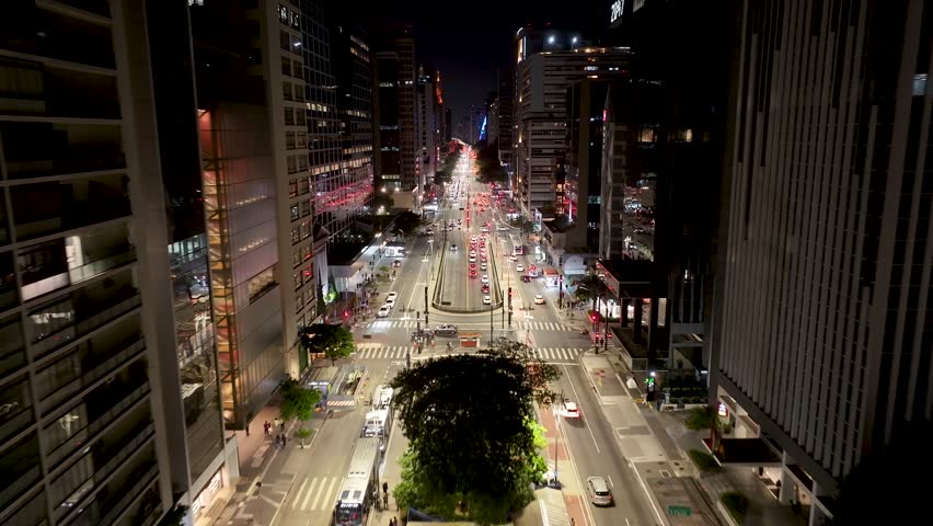 Paulista Avenue At Night In Sao Paulo In Brazil. Night City Landscape. Downtown District. Highrise Buildings. Paulista Avenue At Night In Sao Paulo In Brazil. Night Life Tourism.