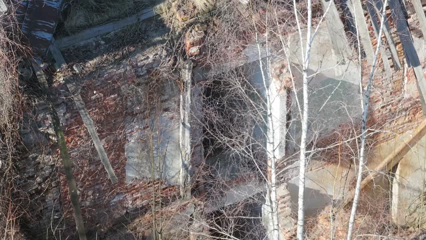 Broken walls in abandoned manor ruins, aerial view