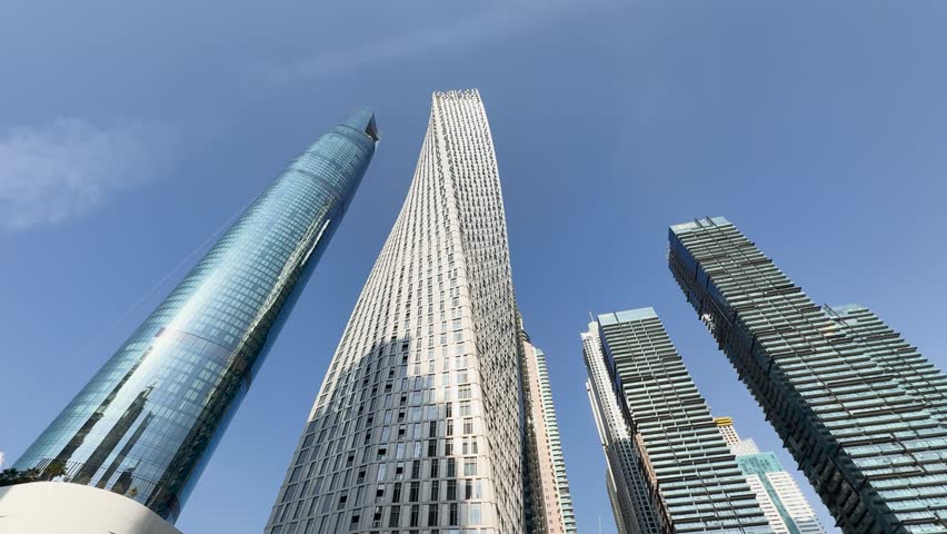 Low angle view of Dubai Marina skyscrapers in Dubai, United Arab Emirates