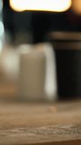 In a bright cafe, a barista in gloves plates a fresh croissant on a white dish, pairing it with a vivid green drink, the scene highlights artisanal pastry service and inviting food culture - Powered by Shutterstock - Get 15% off with code: PIKWIZARD15