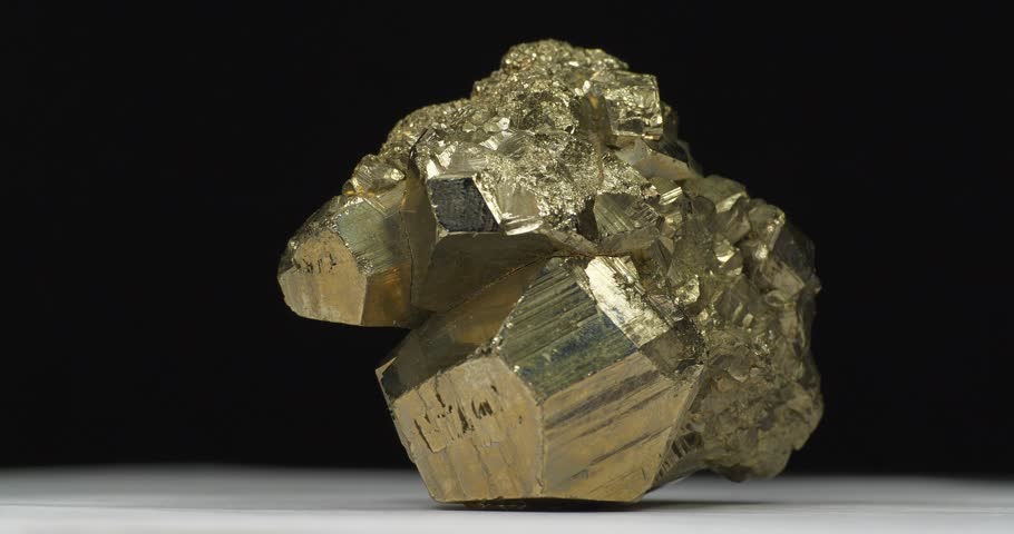 Pyrite mineral, also known as fools gold, shiny iron sulfide in natural crystal form