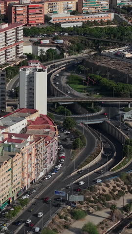 Aerial view of highway interchange and residential buildings in Alicante on Costa Blanca Spain.
