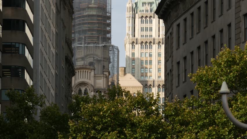 New York City Woolworth building 1913, skyscraper on Broadway in Downtown Financial District, Lower Manhattan, United States of America. Gothic historic architecture, green cooper roof, Battery park.