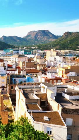 Vertical Rooftop View of Cartagena Cityscape with Roldan Mountain Peak - Murcia, Spain