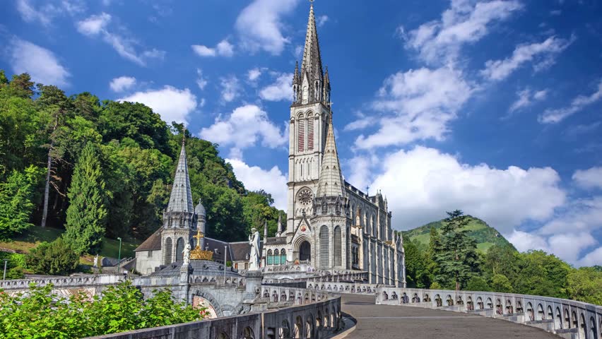 Lourdes, France, 08-june-2025: many pilgrims visiting this Sanctuary of Our Lady of Lourdes on a beautiful spring day, EuropeRosary Basilica in Lourdes, Hautes-Pyrenees, France
