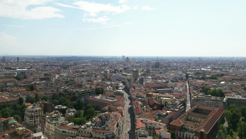 Europe, Italy, Milan drone view Milan downtown fashion district q- Piazza San Babila , Corso Vittorio Emanuele in Duomo Cathedral and new skyline - Via Montanapoleone most expensive area for houses in Milan  real estate 