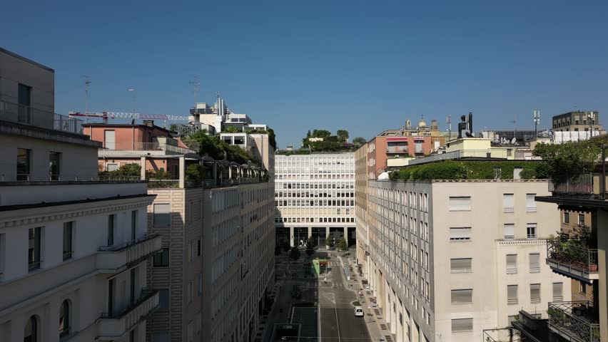 Europe, Italy, Milan drone view Milan downtown fashion district q- Piazza San Babila , Corso Vittorio Emanuele in Duomo Cathedral and new skyline - Via Montanapoleone most expensive area for houses in Milan  real estate 