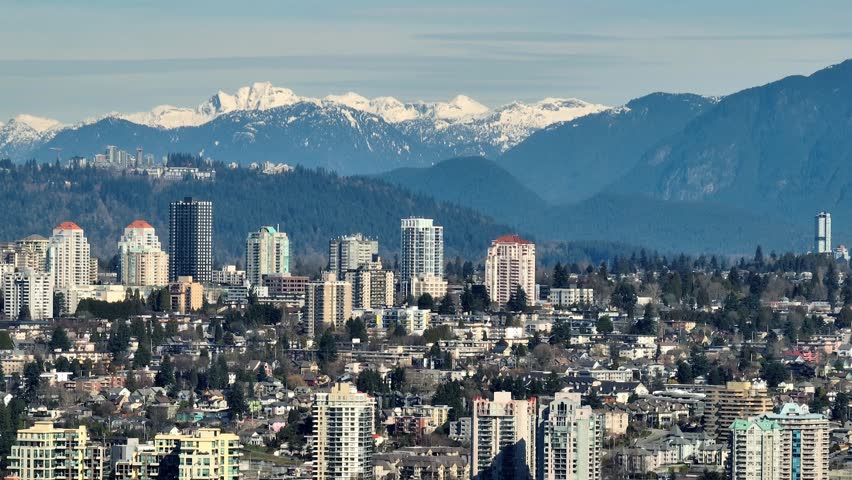 High-rise Cityscape Of The Metrotown Neighbourhood In Burnaby, British Columbia, Canada. Aerial Pan Shot