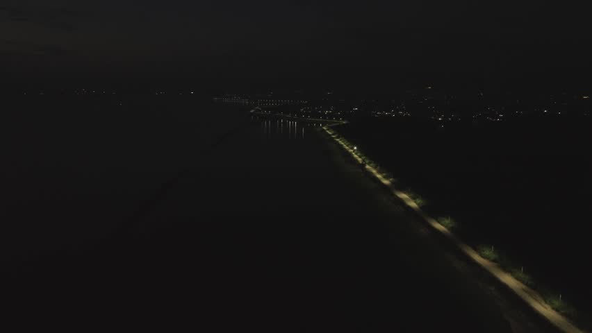 Aerial View of Coastal Town at Night