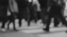 Blurred monochrome business pedestrians walking in an urban street with a gloomy atmosphere - Powered by Shutterstock - Get 15% off with code: PIKWIZARD15