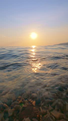 Sunset Over Calm Ocean Waters