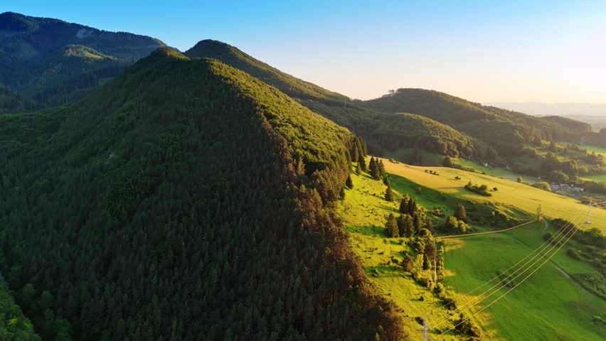 Evergreen pine tree woods cover the stunning Tatra mountains. Aerial perspective on wonderful nature of Slovakia.