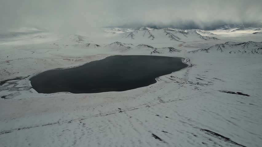 Aerial View Lake Surrounded By Snowy Mountains Mongolia