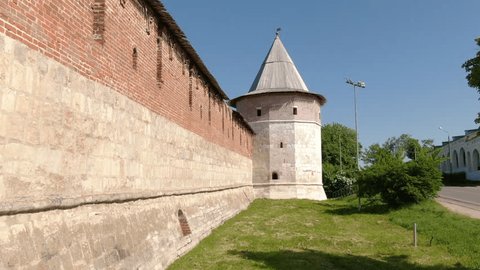 Drone Passing Fortress Wall Tower