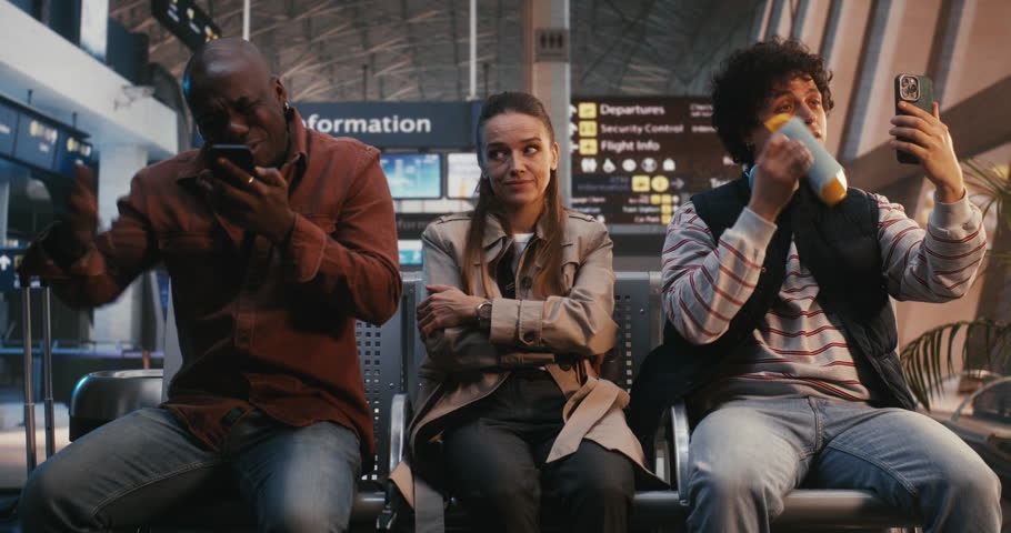 Female Traveler Sits in Airport Area, Displaying Stoic Endurance Despite Clear Discomfort of Crowded Setting. Resilience of Sensitive Individuals Navigating Modern Life Logistical and Social Chaos.