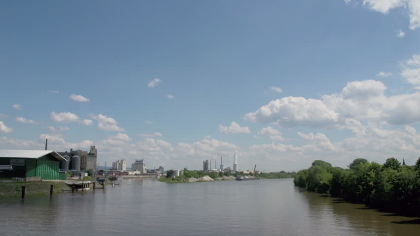 Time lapse river, harbor and industrial area.