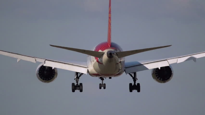 Airplane from behind in slow motion