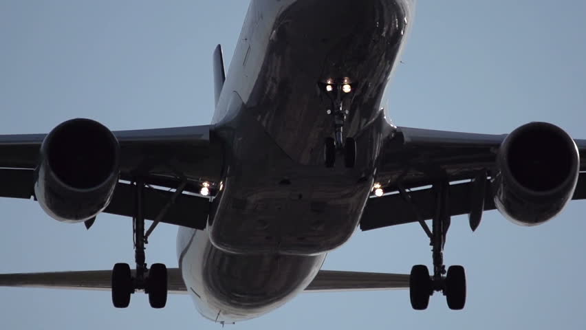 Close-up aircraft landing in slow motion