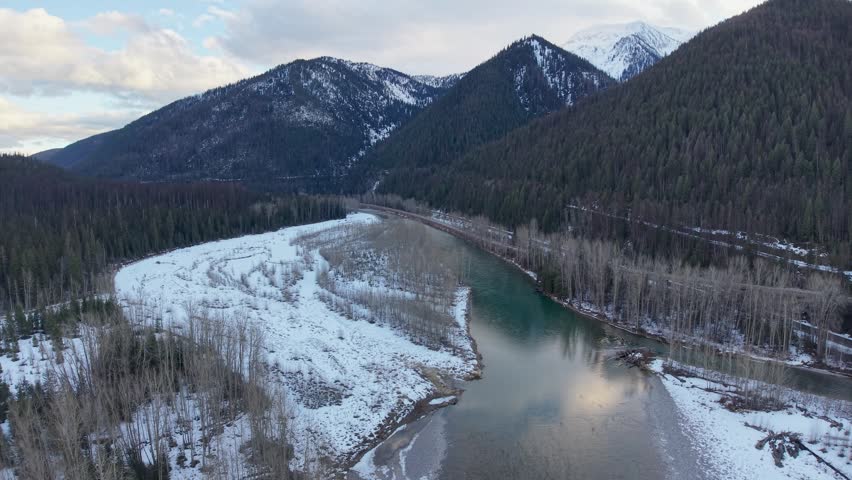 Aerial view of calm flathead river in snowy Montana