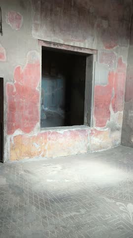 Herculaneum excavations with ancient frescoes, mosaics, and decorations in Roman villas preserved by the eruption of Mount Vesuvius, showcasing art and daily life in Italy.