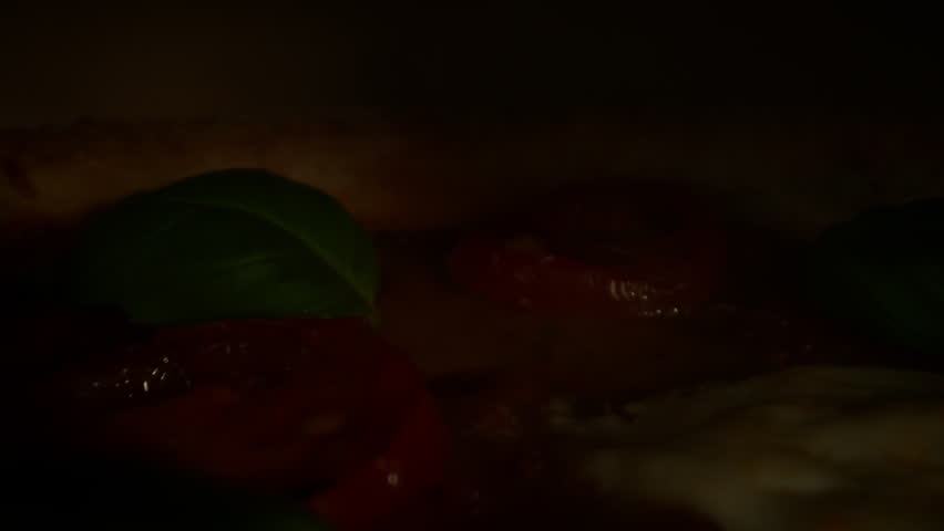 Revealing Fresh Pizza in Slow Motion, Close Up to Wide Motion Control Shot.