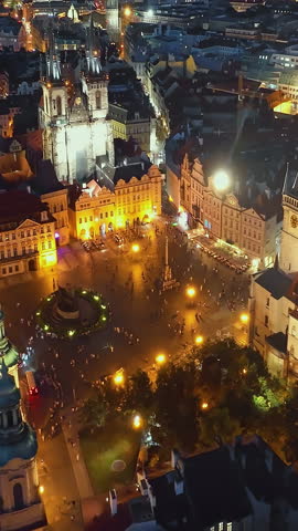  Aerial view of Central Square of city at night, Prague, Czech Republic