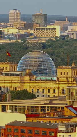  Aerial view of Reichstag in Berlin and Government Buildings and central park at sunrise, Germany