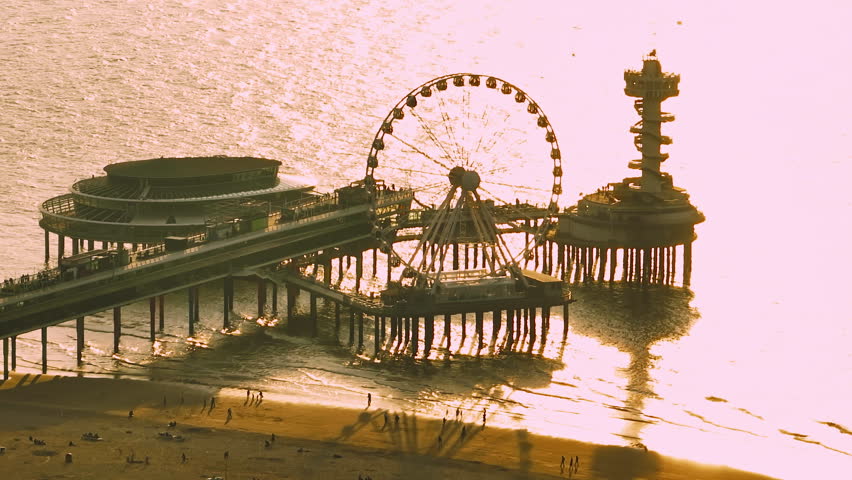 Aerial view of Scheveningen Beach in city Hague, Scheveningen Pier and famous Ferris wheel skyview de Pier