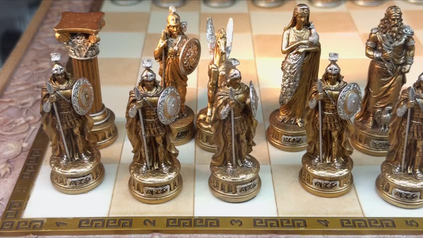 Collectible chess pieces shaped as ancient Greek gods on a board.